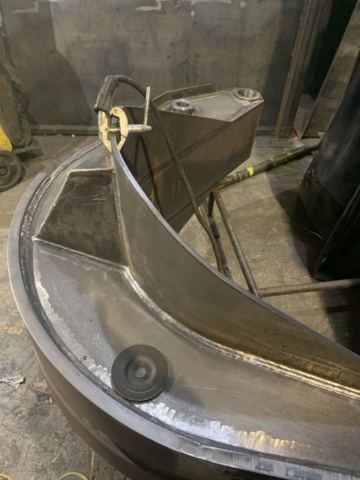 Welding a grab petal fabricated from Hardox & Raex Plate.